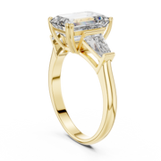 Lab Grown Emerald Cut Three Stone Diamond Ring with Tapered Baguette Sides in Yellow Gold