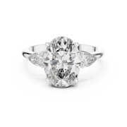 Lab Grown Oval Three Stone Diamond Ring with Pear Side Stones in Yellow Gold