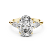 Lab Grown Oval Three Stone Diamond Ring with Pear Side Stones in Yellow Gold