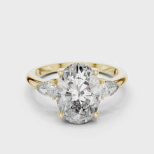 Lab Grown Oval Three Stone Diamond Ring with Pear Side Stones in Yellow Gold