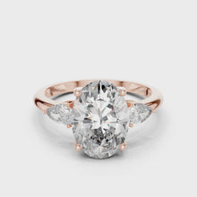 Lab Grown Oval Three Stone Diamond Ring with Pear Side Stones in Yellow Gold