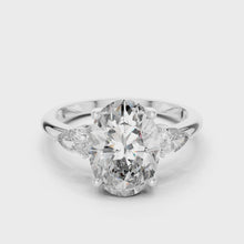 Lab Grown Oval Three Stone Diamond Ring with Pear Side Stones in Yellow Gold